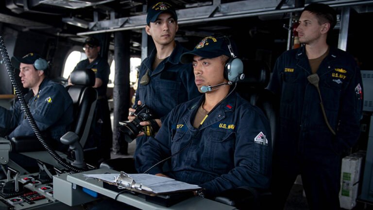 Sailors in the bridge of the Independencevariant littoral combat ship USS Gabrielle Giffords LCS 10 768x432