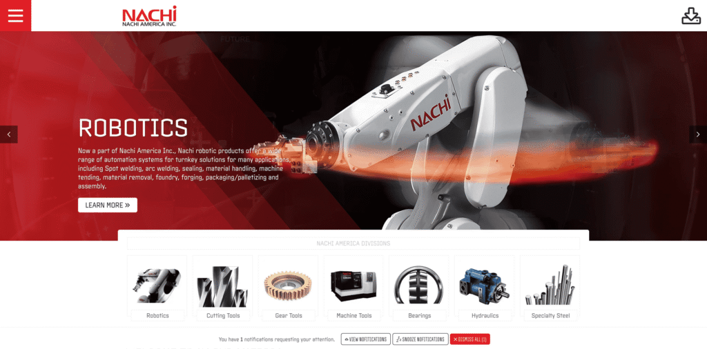 - RobotsInc.com Industrial robotic arm in action on a red-tinged Nachi America robotics banner.