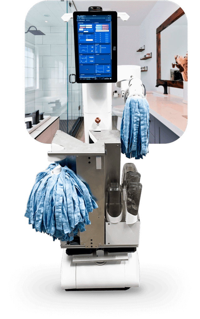 - RobotsInc.com Autonomous floor-cleaning robot with blue microfiber mop pads in a modern bathroom.