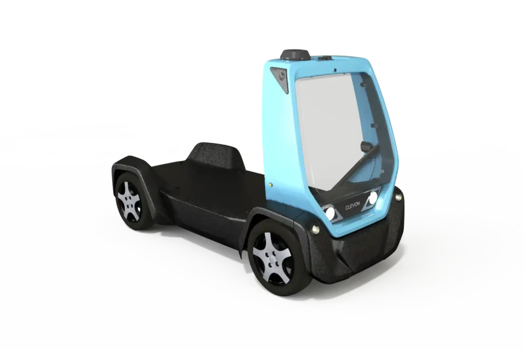 - RobotsInc.com Autonomous delivery vehicle with a blue cabin and black chassis, four wheels, facing slightly to the right.