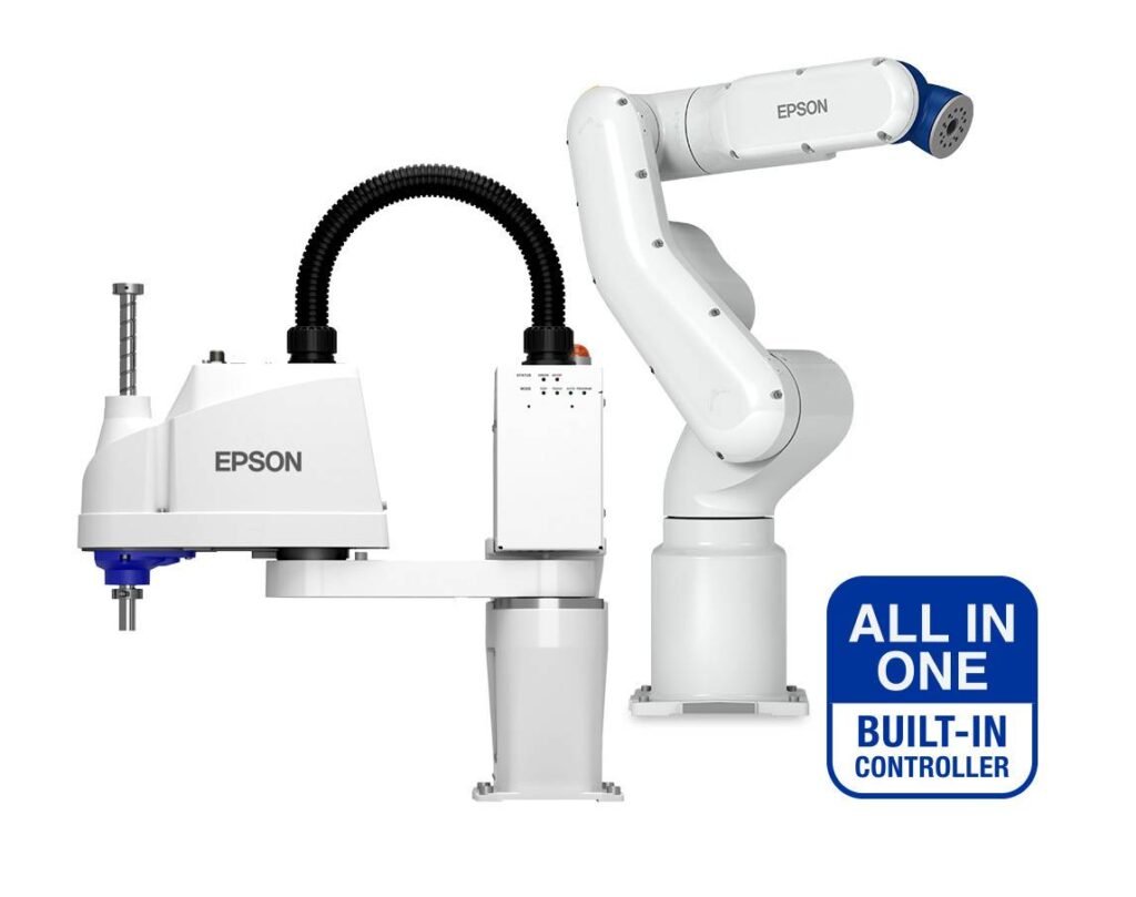 - RobotsInc.com White Epson industrial robotic arm with built‑in controller and a blue All in One Built‑In Controller badge on the side