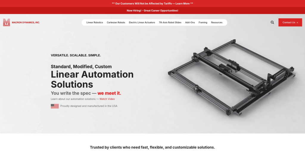 - RobotsInc.com Macron Dynamics hero: a metal linear automation frame on the right with bold 'Linear Automation Solutions' text on the left.