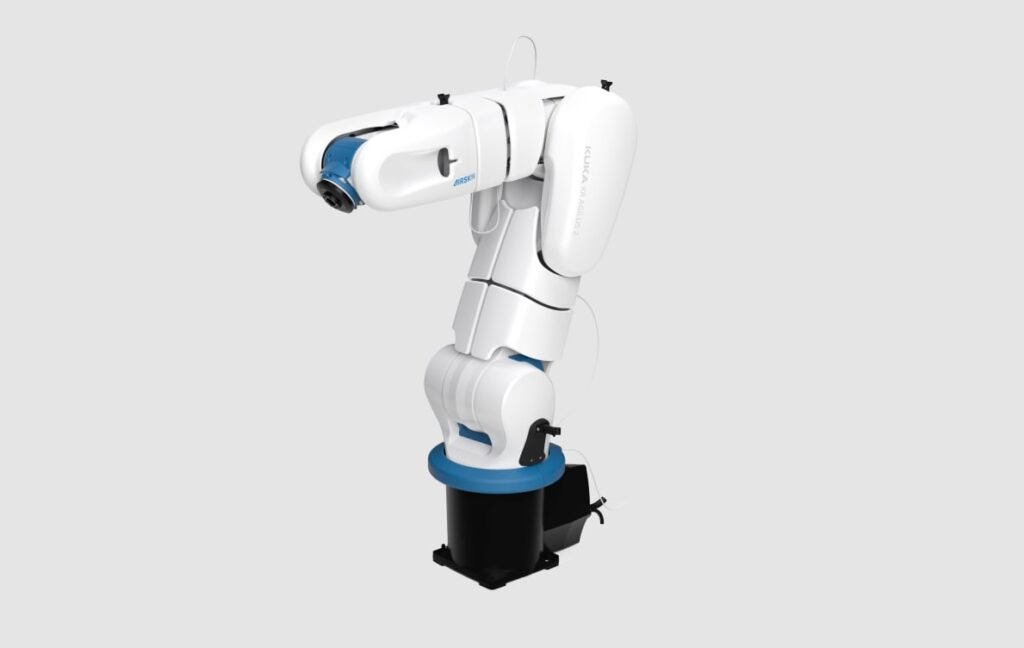 - RobotsInc.com White industrial robotic arm with blue accents mounted on a black base, extending a forearm ready for operation.