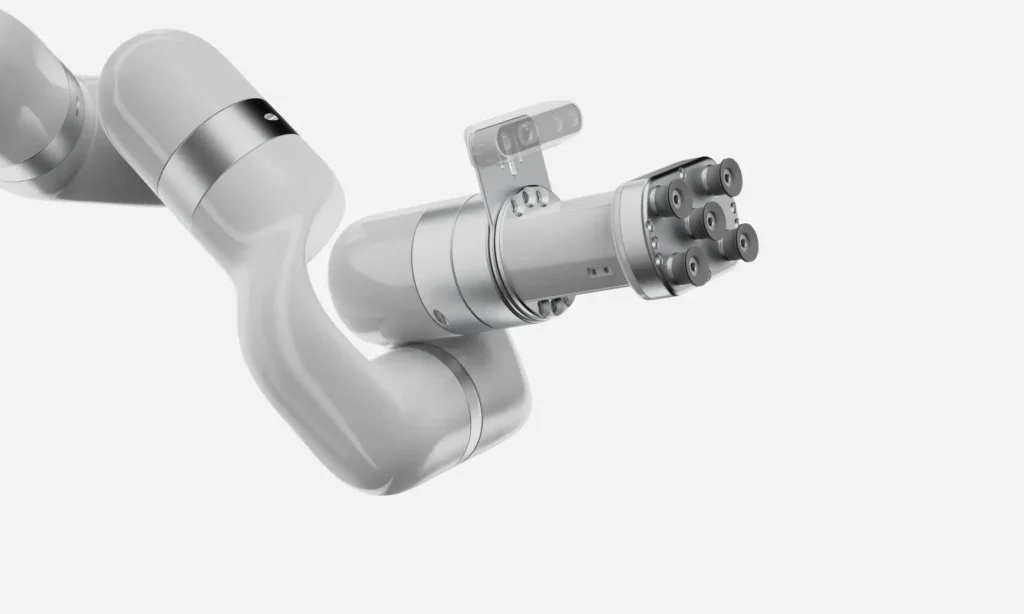 » RobotsInc.com Close-up of a metallic robotic arm end effector with a multi-spindle cluster of round tool heads in a silver rendering.