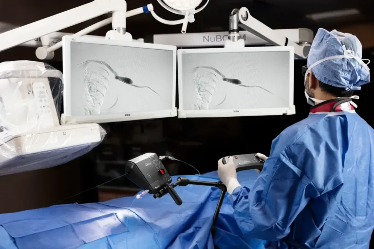 Doctor looking at monitor 1240x827 min 768x512